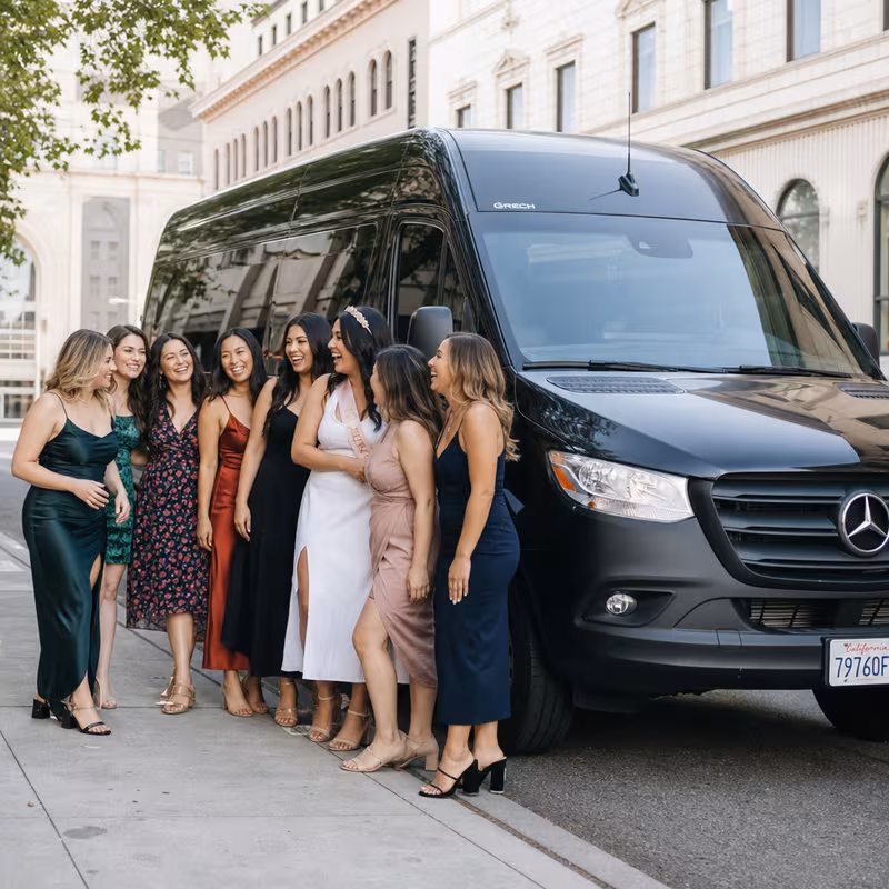 Group boarding a white charter bus for Bachelor & Bachelorette Transportation transportation in Stockton