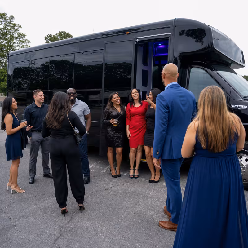 Passengers loading luggage while boarding an Stockton group shuttle