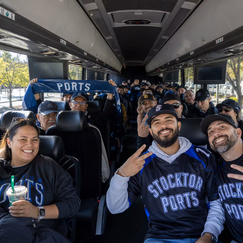 Black Mercedes Sprinter van staged for an Stockton Sporting Event Transportation group